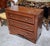 Art Deco Chest of Drawers in Mahogany and Stained Wood This elegant Art Deco chest of drawers, crafted from mahogany and...