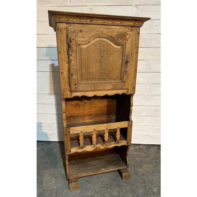 A wonderful French Oak Dresser. Dating to the early 19th Century and oozing charm and character. A single door to the top...