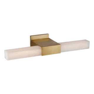 Kelly Wearstler for Visual Comfort Signature Covet 24" Over The Mirror Bath Light in Antique-Burnished Brass with Alabaster For Sale