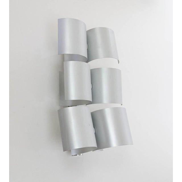 Large wall lamp produced by Nucleo Sormani in the 1970s. The lamp consists of six -similar but not the same- curved...