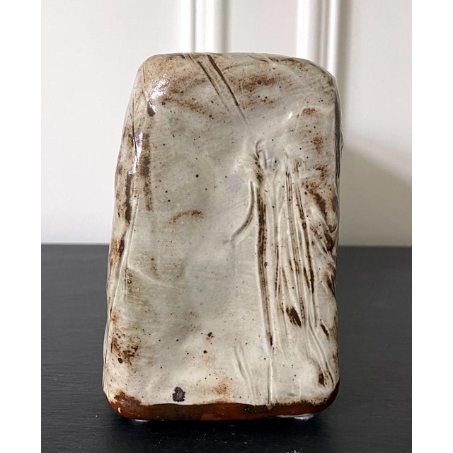 A ceramic sculpture piece created in the tradition of Buncheong ware by contemporary Korean ceramicist Sung Jae Choi...