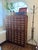 Vintage library card catalog cabinet in excellent condition. Beautiful warm wood tone with original hardware and an...