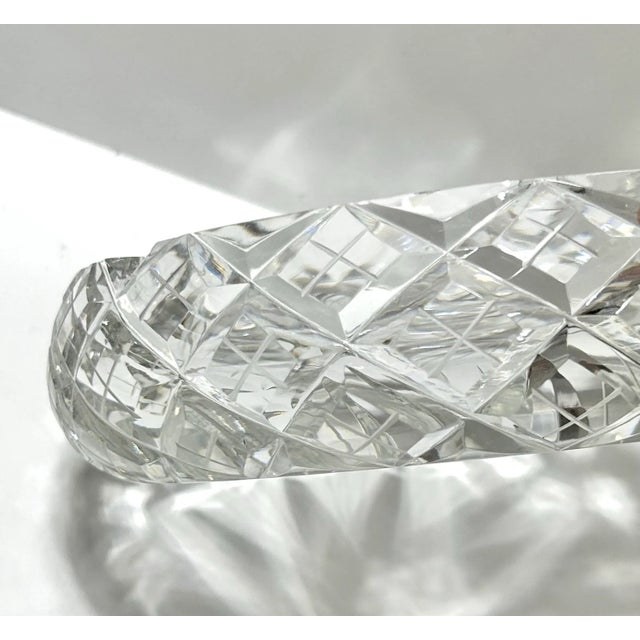 This handsome and very heavy-weight cut crystal ashtray/catchall has a beautiful etched star right in the center. It...