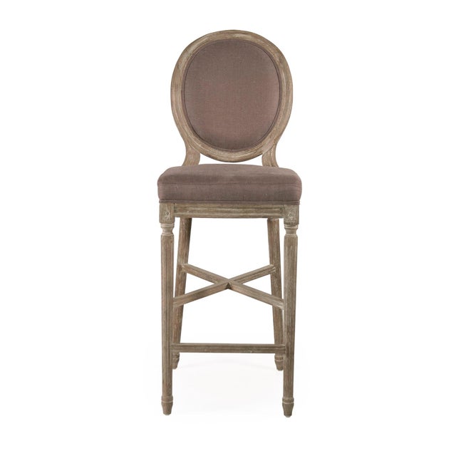 The Medallion Bar Stool from Zentique brings the iconic Louis XVI oval-back (medallion) silhouette to bar height at 30"....