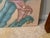 1980s artwork depicts four stylized calla lilies with large green leaves on a muted, warm-toned background. Pink /Mauve...