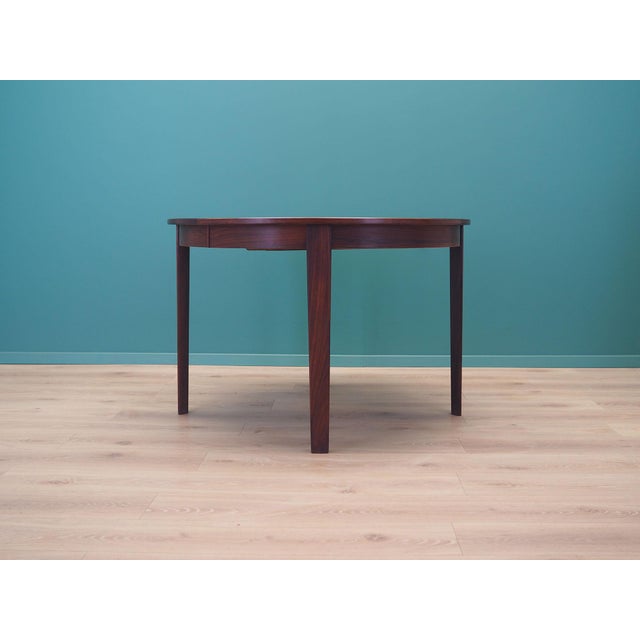 The table was made in the 1960s, Danish production. The structure and table top are covered with rosewood veneer. The legs...