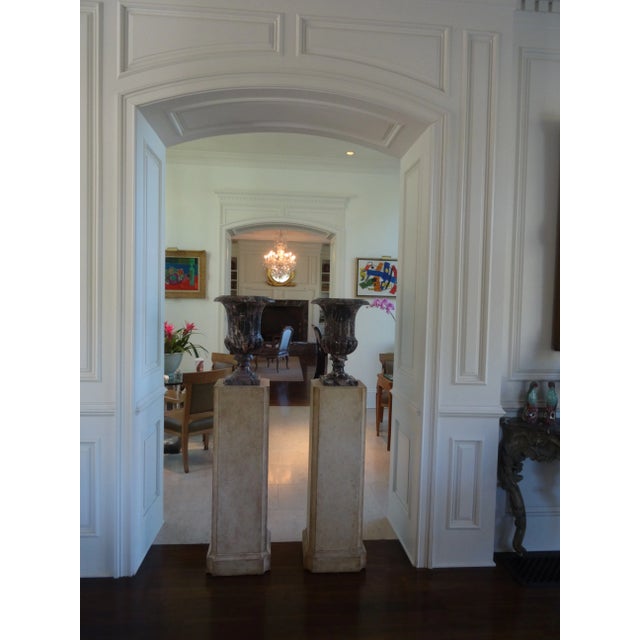 A Fabulous Pair of Classic Pedestals made of wood with a semi Faux Stone Finish. 12"x12" at Top 14"x14" at Base 41" Height