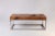 This gorgeous coffee table is hand made from one single slab of teak wood. Both sides of the top are hand polished and can...