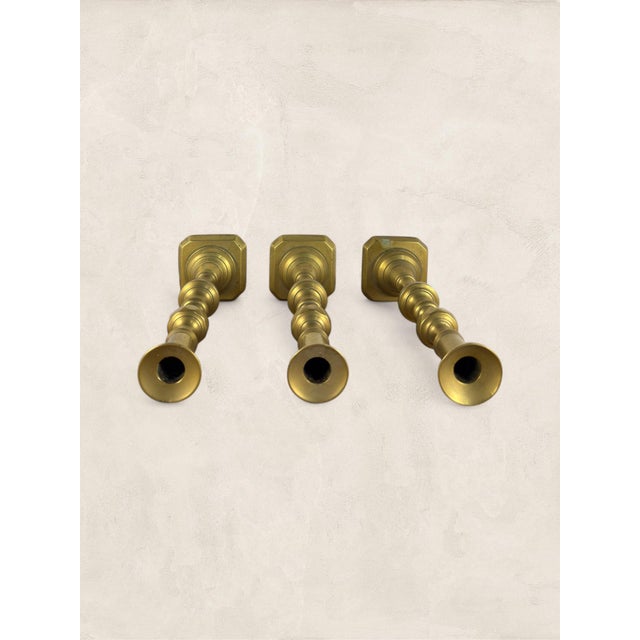 Antique English Three Victorian Brass Candlesticks Few candlestick designs carry as much history as the beehive and...