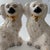 Pair of vintage Beswick Staffordshire-style spaniel mantle dogs, made in England. Each ceramic figure features a glossy...