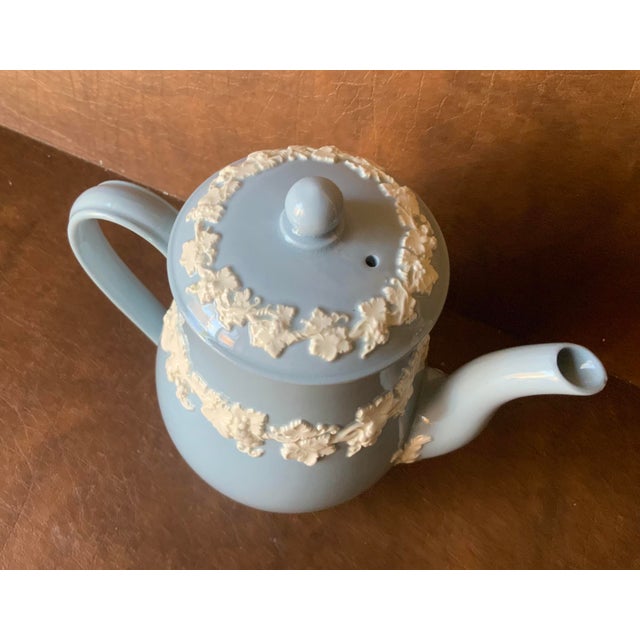 Embossed “Lavender & Cream” extremely RARE with wreath around base of spout.