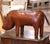 Bring charm, craftsmanship, and a touch of British wit to your interior with this mid-century leather rhinoceros,...