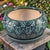 This vintage glazed pottery planter features a beautiful teal, green, and blue color palette, making it a unique and...