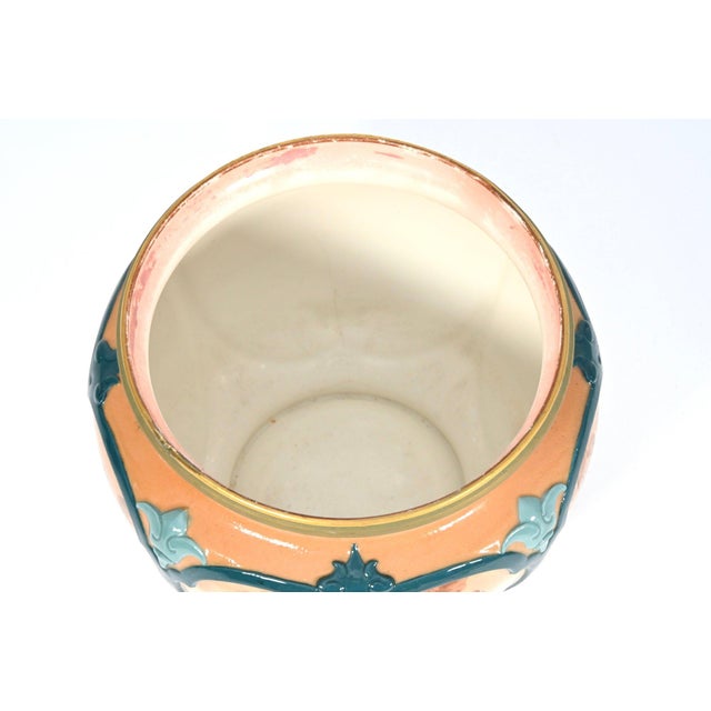A beautifully hand-painted Royal Worcester Hadley Ware porcelain jardinière (cache pot), crafted in England in the...