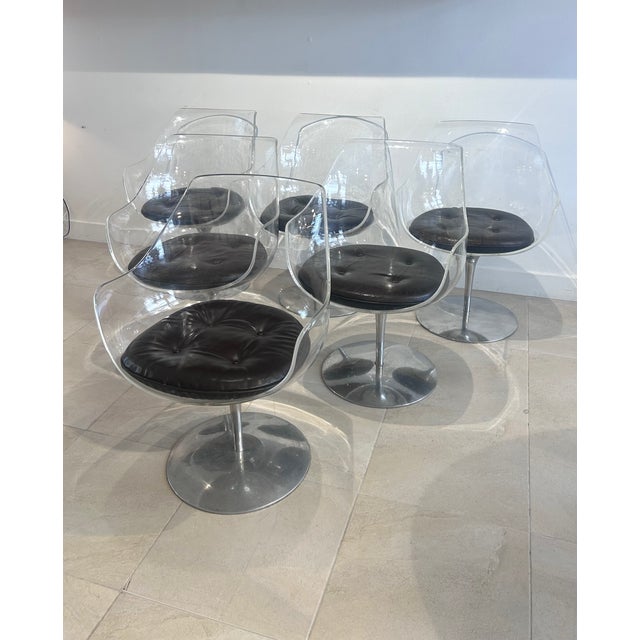 Six "Champagne" chairs by Estelle and Erwin Laverne, made of acrylic, dating from the 1950s, with an aluminum base and a...
