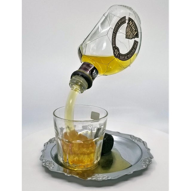 Pop Art Sculpture of Pinch Liquor Bottle Pouring a Drink Designed by