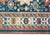 An outstanding early 20th century Persian Shriven rug with three large stylized floral medallions living amidst a field...