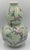Qing Dynasty Double-Gourd Celadon Vase, a truly exceptional piece of Chinese artistry. Bearing the prestigious Qianlong...