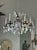 Pair of Maison Bagues Patinated Iron and Rock Crystal Chandeliers For Sale - Image 4 of 9
