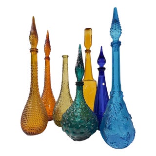 A Symphony of Saturated Light attributed to Empoli Genie Bottles, 1960s, Set of 7 For Sale