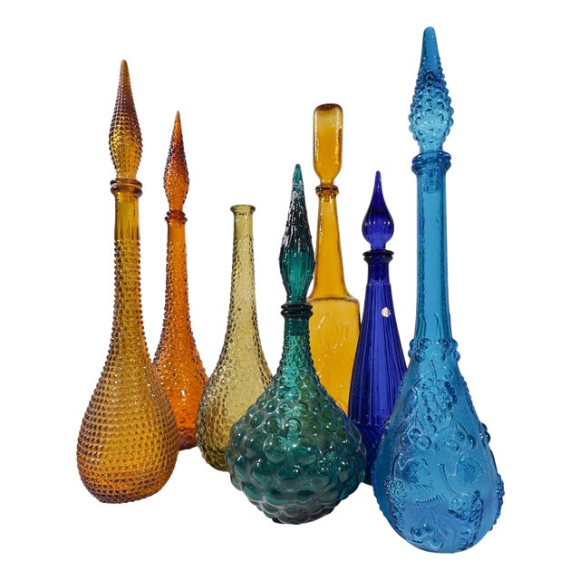 A Symphony of Saturated Light attributed to Empoli Genie Bottles, 1960s, Set of 7 For Sale