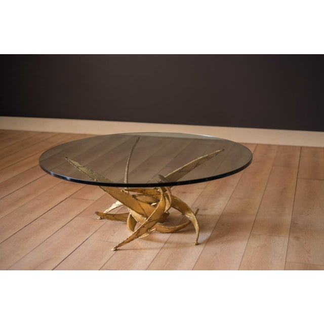 Mid Century Modern Brutalist sculptural round glass coffee in the manner of Silas Seandel, circa 1970's. Features an...