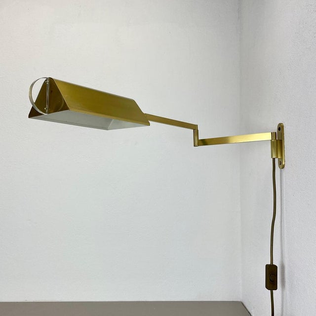 Article: Wall light Origin: Italy (marked with OMI, see image 20 Decade: 1970s This wall light was designed and produced...