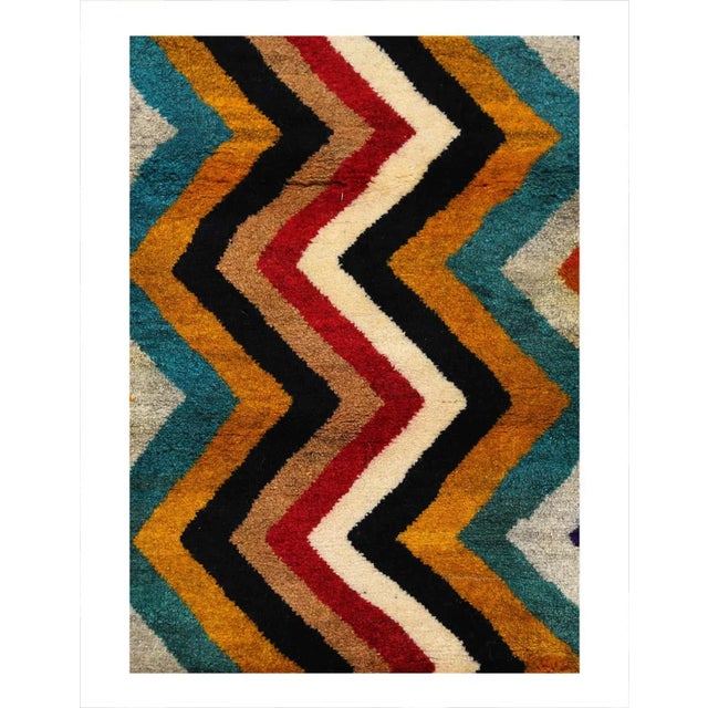 This Shiraz carpet reflects the handicraft of Nomads from the province Fars. Its simple design, the beautiful colours and...