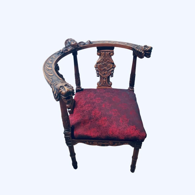 This antique Renaissance Revival corner chair is a captivating example of period craftsmanship, highlighted by intricately...