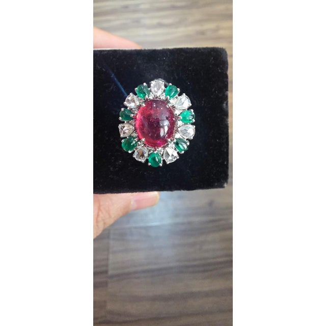 Gemstone details Ruby: 6.06cts Diamond: 0.17cts Fancy diamond: 0.97cts Emerald: 1.4cts G. wt: 8.66 grams N. wt: 6.92 grams...
