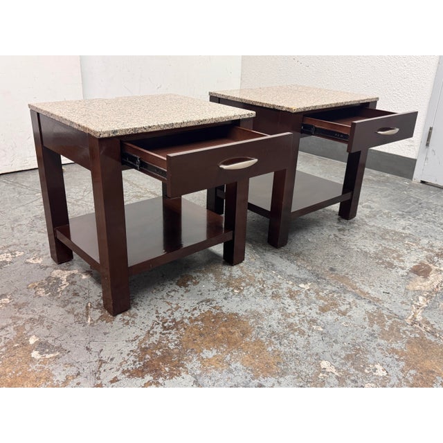 Design Plus Gallery presents a pair of Stone Top Nightstands from Bermanfalk. Each nightstand pairs a speckled stone inset...