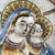Madonna and Child in Enamelled Terracotta, 1600. This rectangular devotional plaque features a delicate polychrome image...