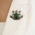 The Antique-Style Oxidized Silver Emerald, Ruby & Diamond Frog Brooch Pendant showcases a distinctive figural design...