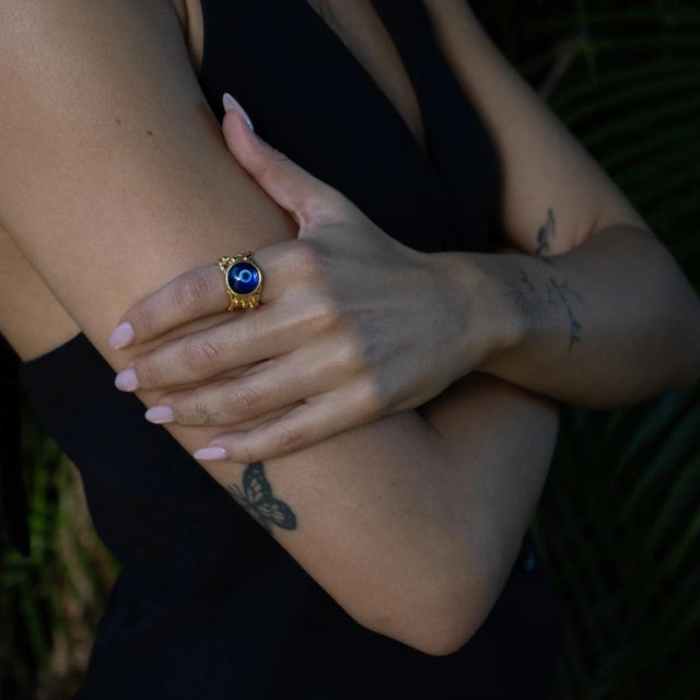 Embrace timeless protection and elegance with our Guardian Evil Eye Adjustable Gold Ring. Handcrafted with care, this...