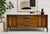 Walnut Mid Century Modern Credenza Dresser by Broyhill Premier's Emphasis Line, c. 1960's. Boasting gorgeous wood grains,...