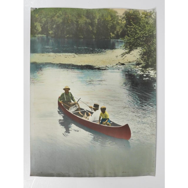 Early 20th century colortone advertising photograph of fishermen in a canoe. Unsigned. Unframed, spots around lower left...