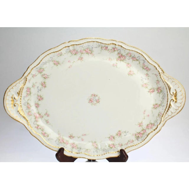 Presented here for your consideration is a Theodore Haviland Limoges double gold 16 inch serving platter. Schleiger Number...