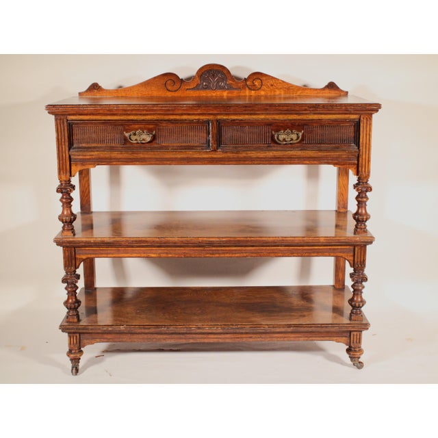 English Victorian oak and pollard oak etagere, circa 1890. With a back splat with vine and bellflower carving, 2 drawers...