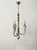 Maker: Hart Associates Color/Finish: Distressed white/cream, antiqued brass Lighting: 3 candelabra-base sockets Condition:...