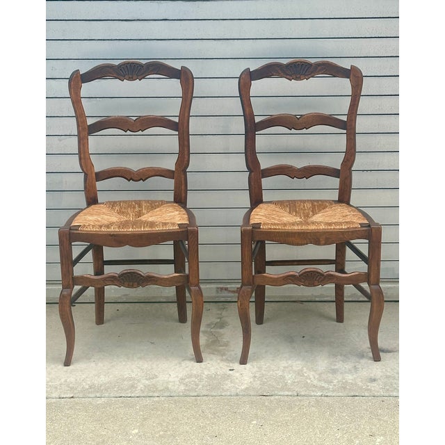 Pair of Louis XV style oak dinning room / side chairs with great proportions and nicely executed cabriole legs. The chairs...