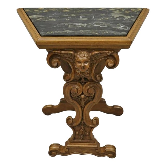 Early 20th Century Italian Renaissance Figural Carved Marble Top Side Table With Winged Cherub Head For Sale