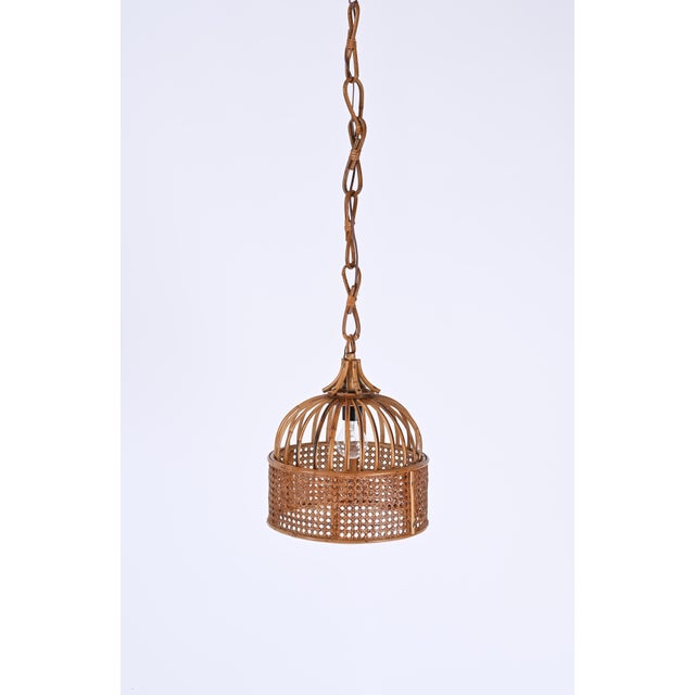 Lovely round pendant in bamboo and rattan with vienna straw wicker shade. This gorgeous french riviera style chandelier...