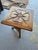Add rustic character and vintage charm to your space with this unique, folk-art-style accent table. Crafted from solid...