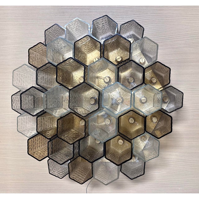 The complex layered design, exquisite use of specialty glass, and scale of Helsinki make a glamorous first impression....