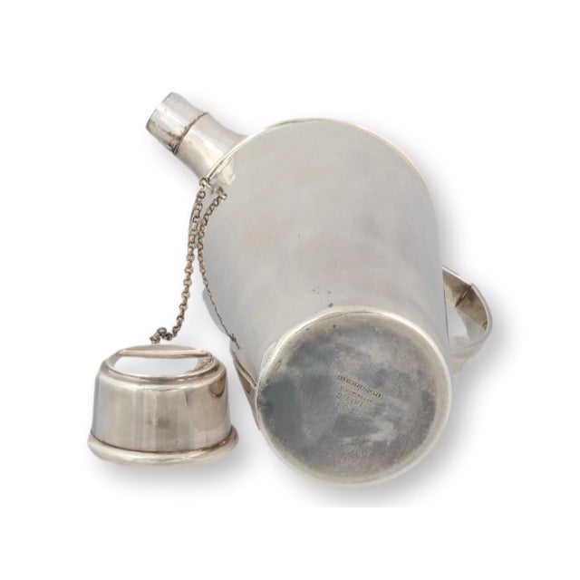 Elegant silver-plated cocktail shaker by Elkington & Co., one of England’s finest 19th- and 20th-century silversmiths....