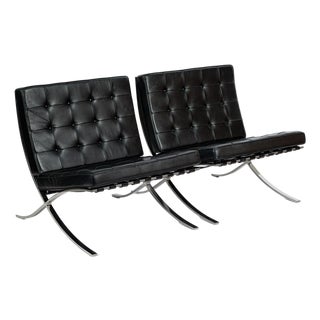 Pair Mid Century Black Leather Barcelona Chairs by Mies Van Der Rohe for Knoll, 1977 For Sale