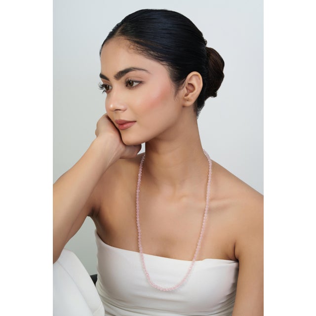 Add a refined touch to your jewelry collection with this elegant 26-inch beaded necklace, featuring natural Rose Quartz...