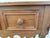 Charming vintage rustic European style pine console table featuring three drawers, beautifully turned legs, and a...