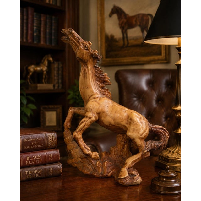 Striking vintage Italian sculpture depicting a rearing horse in a dramatic and energetic pose. Crafted in resin with a...