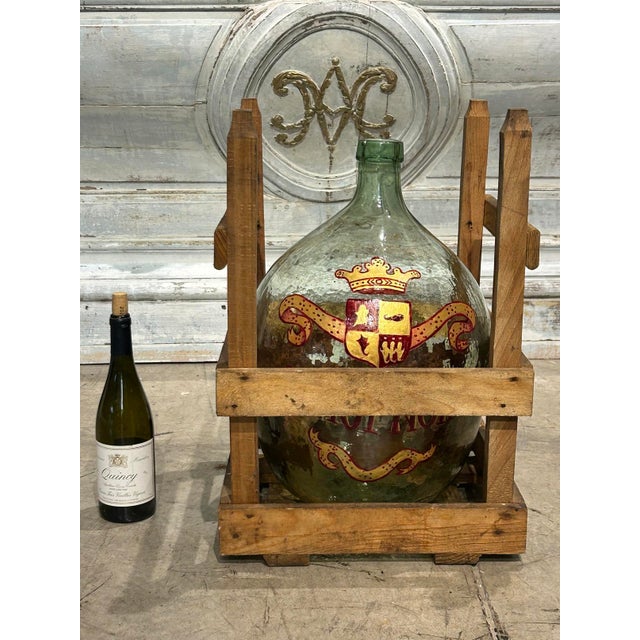 More information coming soon… This painted demi john bottle is quite a find, as the vessel is still nestled in its...
